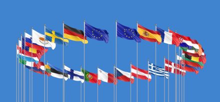 27 waving flags of countries of European Union (EU). Blue sky background. 3D illustration