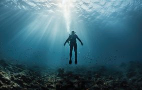 Diving lesson in open water. Scuba diver before diving into ocean. generative ai