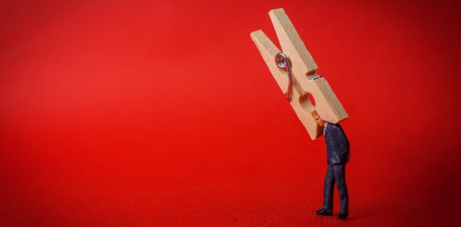 Businessman Clothespin Headache